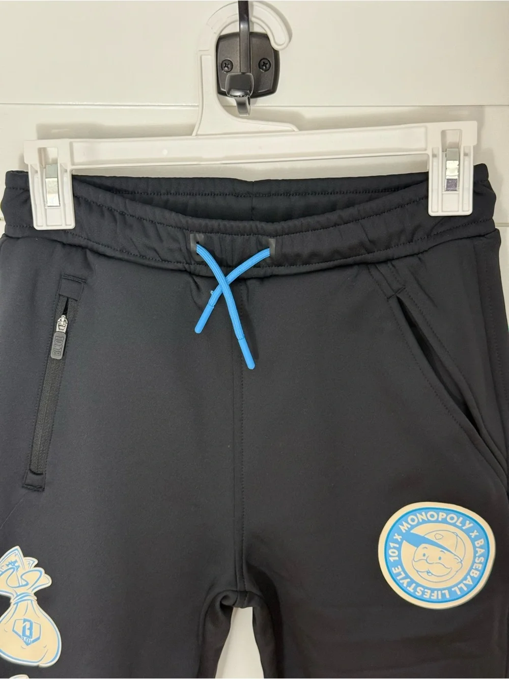 Black Kids Joggers with Light Blue Badge Accents